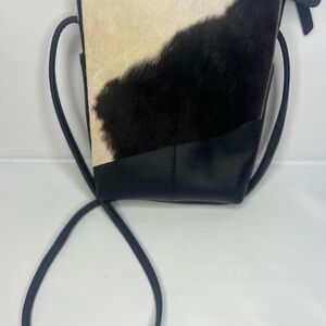 Genuine Leather + Cowhide Crossbody Bag
Overland